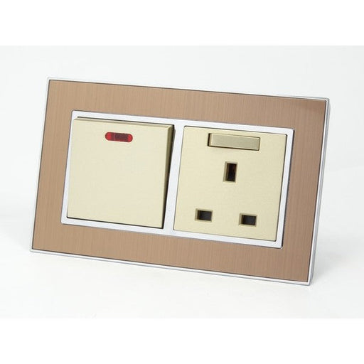Satin Gold metal double frame with Gold inserts switch with neon and switched uk socket
