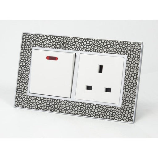 pearl leather double frame with white insert of switch and UK socket