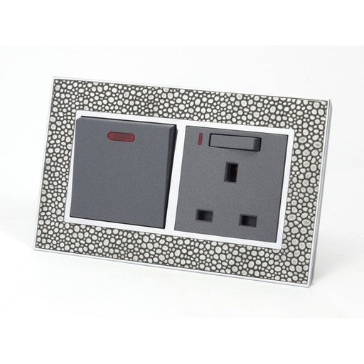 pearl leather double frame with grey insert of switch and neon switched UK socket