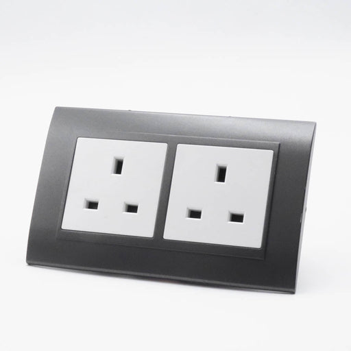 Dark Grey Plastic Arc Double Frame with white Interests of both UK sockets