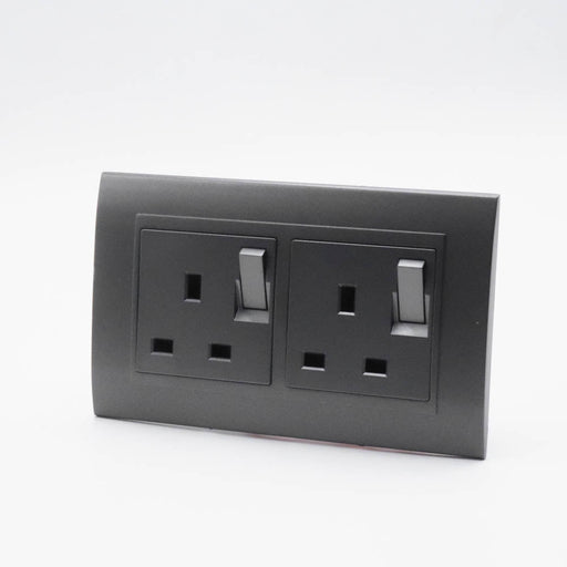 Dark Grey Plastic Arc Double Frame with Dark Grey Interests of both Switched UK sockets