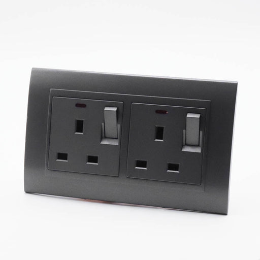 Dark Grey Plastic Arc Double Frame with Dark Grey Interests of both Switched neon UK sockets