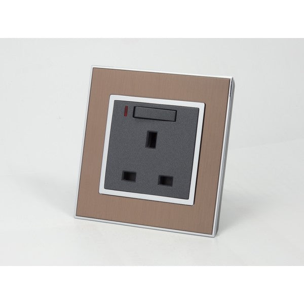 Gold Satin Metal Single Frame with dark grey insert of neon switched uk socket