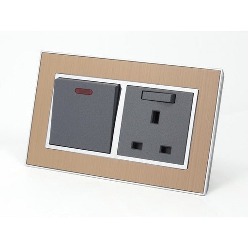 Satin Gold metal double frame with gray inserts switch with neon and switched uk socket