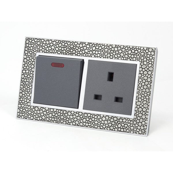 pearl leather double frame with grey insert of switch and UK socket