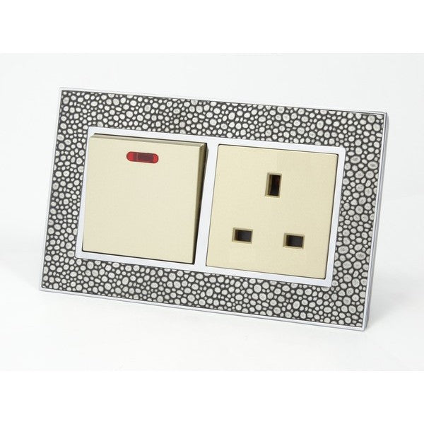 pearl leather double frame with gold insert of double switch and UK socket