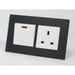 black glass double frame with white modules of a switch and a UK socket