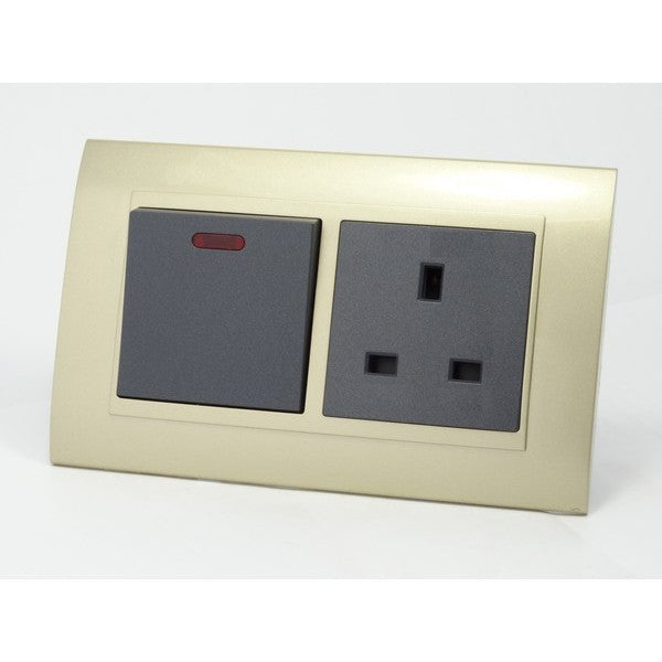 Gold Plastic Double Frame with dark grey insert of switch and uk socket