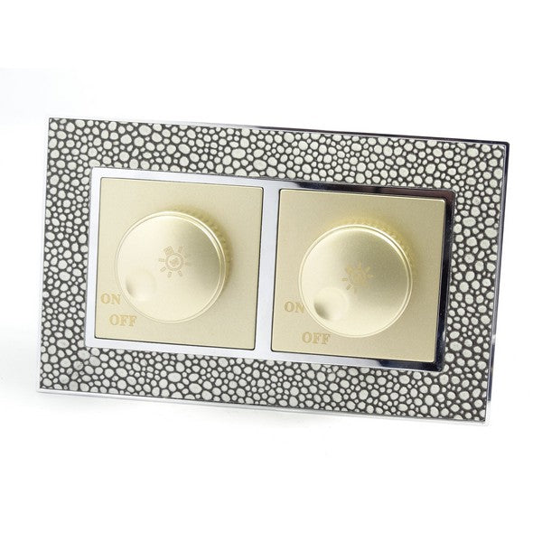 pearl leather double frame with gold insert of double rotary dimmer light switch