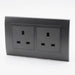 Dark Grey Plastic Arc Double Frame with Dark Grey Interests of both UK sockets