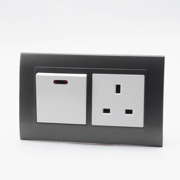 Dark Grey plastic with arc double frame with white inserts of 45a switch and uk socket