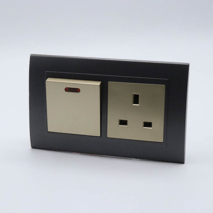 Dark Grey plastic with arc double frame with gold inserts of 45a switch and uk socket