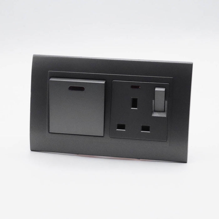 Dark Grey plastic with arc double frame with dark grey inserts of 45a switch and switched neon uk socket